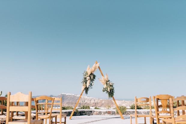 Triangle arch - modern bohemian wedding in Greece