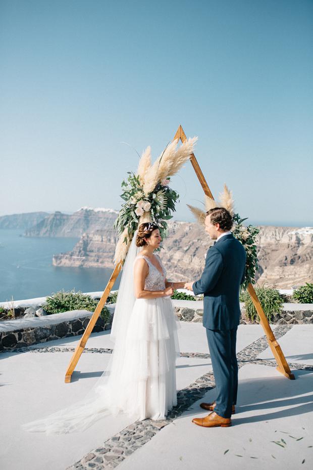 Modern bohemian wedding in Greece- Triangle arch