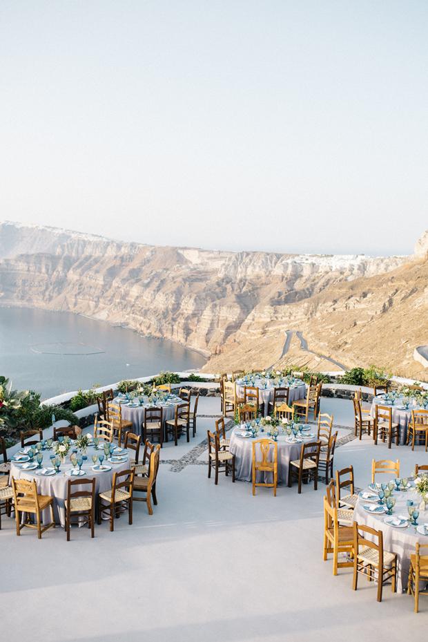 Bohemian wedding  reception in Greece-mismatched chairs 