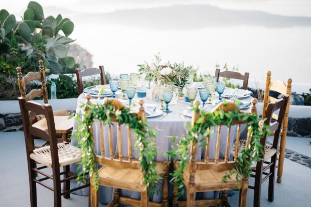 Bride and groom chairs - bohemian wedding in Greece