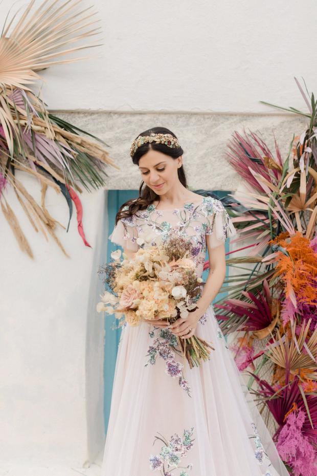 dried flowers bouquet and a sequin floral wedding dress 