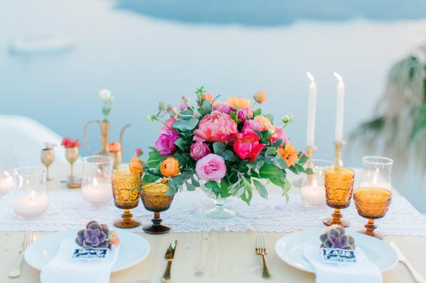 Santorini vintage wedding- tablescape in coral and pink