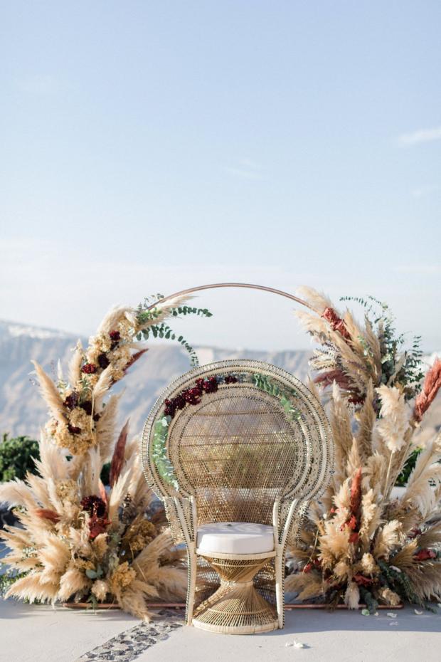 wedding peacock chair and pampas grass