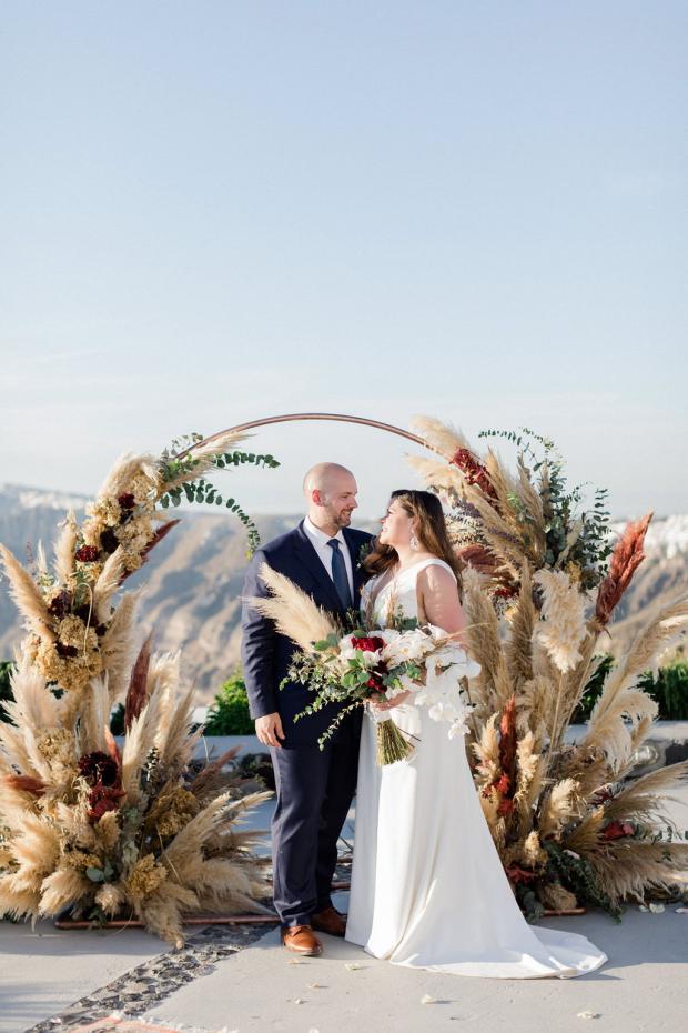 Burgundy pampas and dried flowers arch 