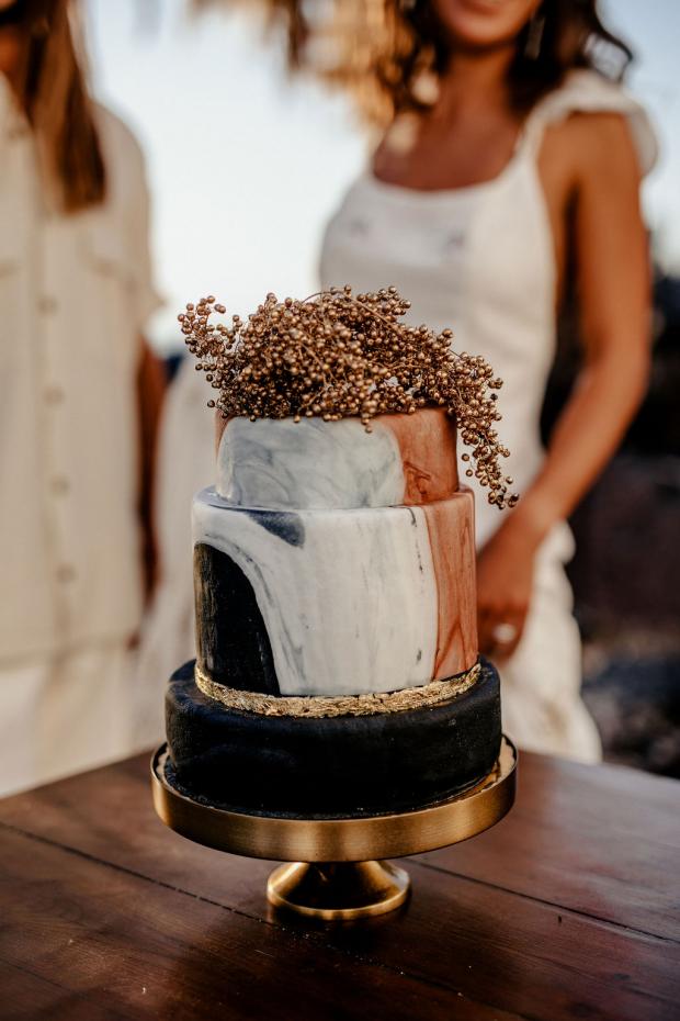 Adventurous elopement in Greece- marble black cake