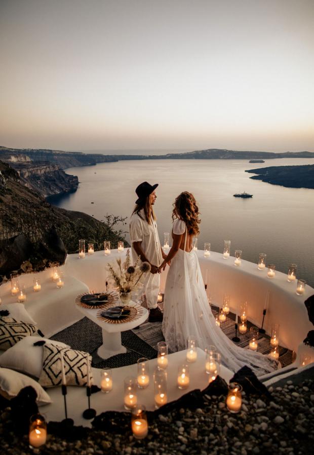 Romantic dinner at a Cycladic balcony in Santorini, Greece