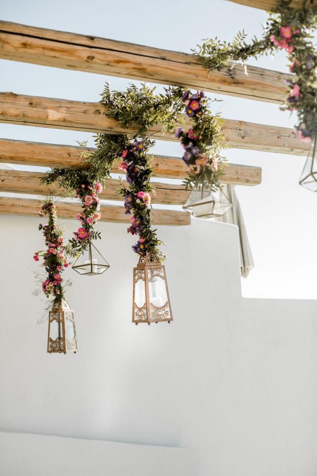 Lanterns with hanging flowers- Whimsical destination wedding 