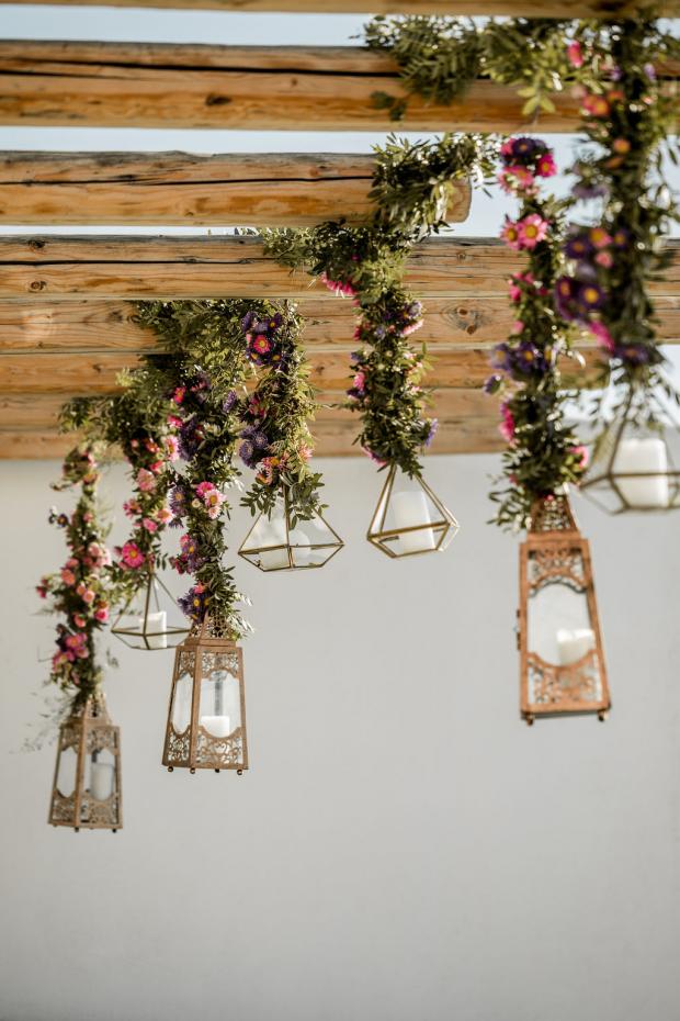 Lanterns with hanging flowers- Whimsical destination wedding 