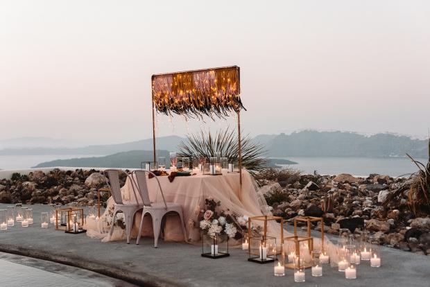romantic elopement dinner in Santorini- candles and fairy lights