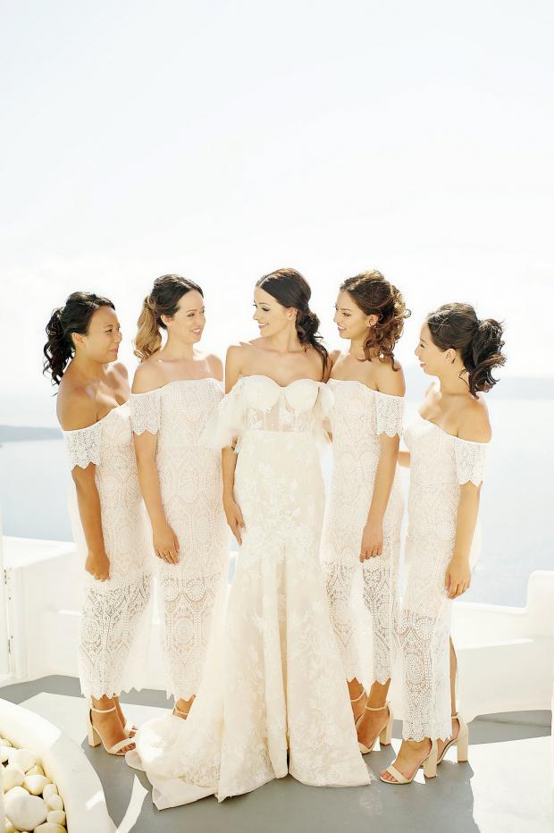 Bride in Berta Gown and all white bridesmaids