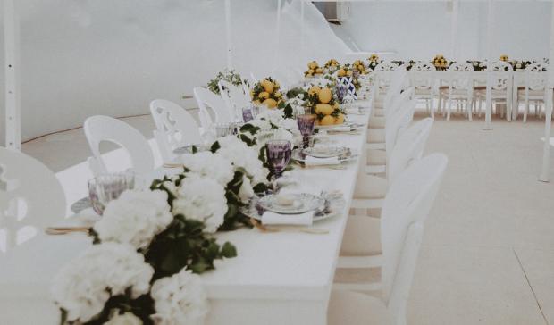 White - blue and lemon wedding reception in Greece