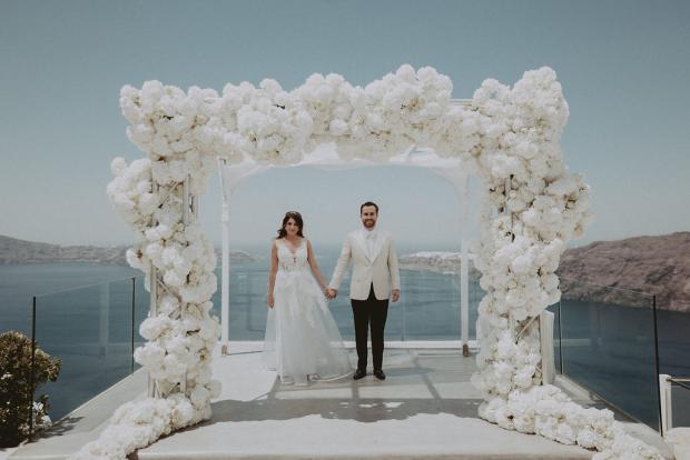 All  white luxury wedding arch- Wedding in Santorini, Greece