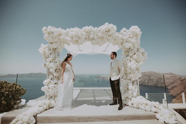 All  white luxury wedding arch- Wedding in Santorini, Greece