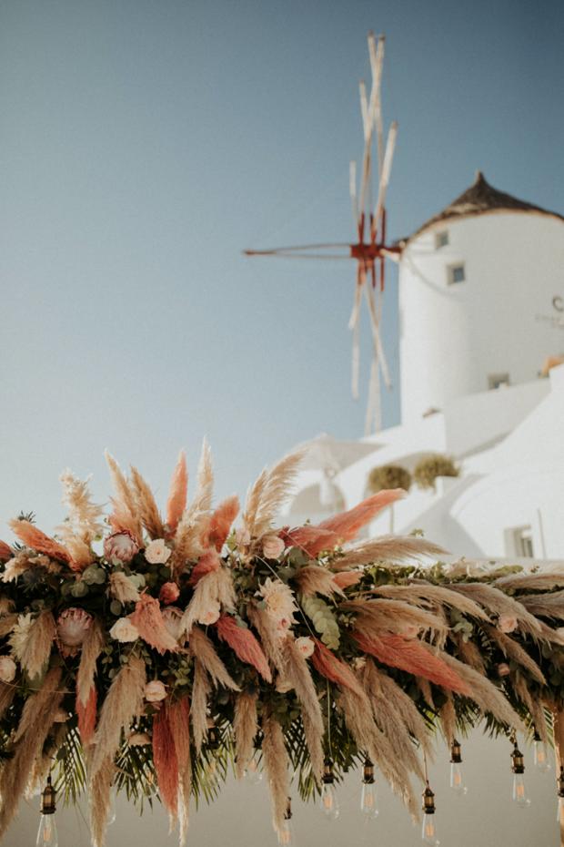Intimate wedding dinner in Greece with pampas grass
